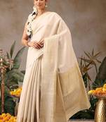 Off white woven silk blend ethnic saree with blouse piece