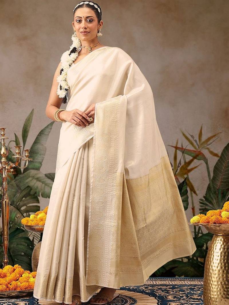 Off white woven silk blend ethnic saree with blouse piece