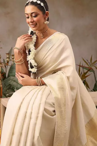 Off white woven silk blend ethnic saree with blouse piece