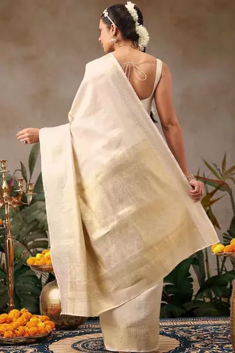 Off white woven silk blend ethnic saree with blouse piece