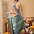 Peach printed tissue traditional saree with blouse piece