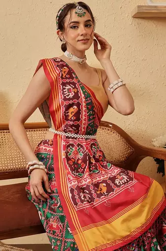 Red printed silk blend ethnic saree with blouse piece