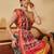 Red printed silk blend ethnic saree with blouse piece