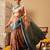 Peach printed tissue traditional saree with blouse piece
