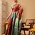 Peach printed tissue traditional saree with blouse piece