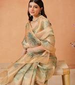 Beige printed tissue traditional saree with blouse piece