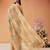 Beige printed tissue traditional saree with blouse piece