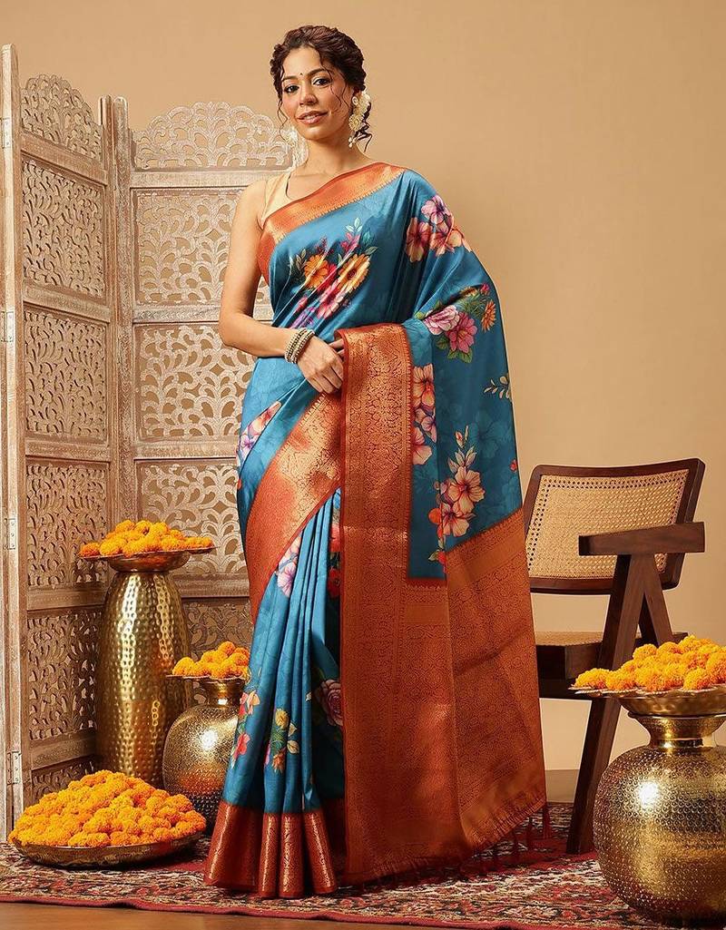 Teal printed art silk ethnic saree with blouse piece