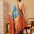 Teal printed art silk ethnic saree with blouse piece