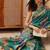 Teal printed silk blend ethnic saree with blouse piece