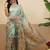 Sea green printed tissue traditional saree with blouse piece