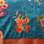 Teal printed art silk ethnic saree with blouse piece