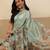 Sea green printed tissue traditional saree with blouse piece