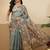 Teal printed tissue traditional saree with blouse piece