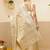 Off white woven tissue party wear saree with blouse piece