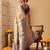 Beige printed tissue traditional saree with blouse piece