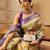 Beige printed tissue traditional saree with blouse piece
