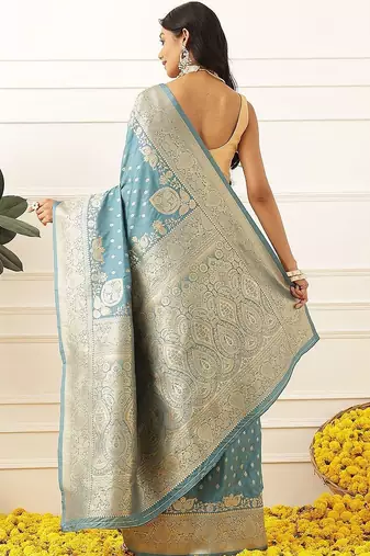 Teal woven art silk traditional saree with blouse piece