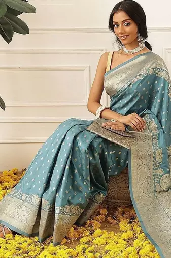 Teal woven art silk traditional saree with blouse piece