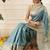 Teal woven art silk traditional saree with blouse piece