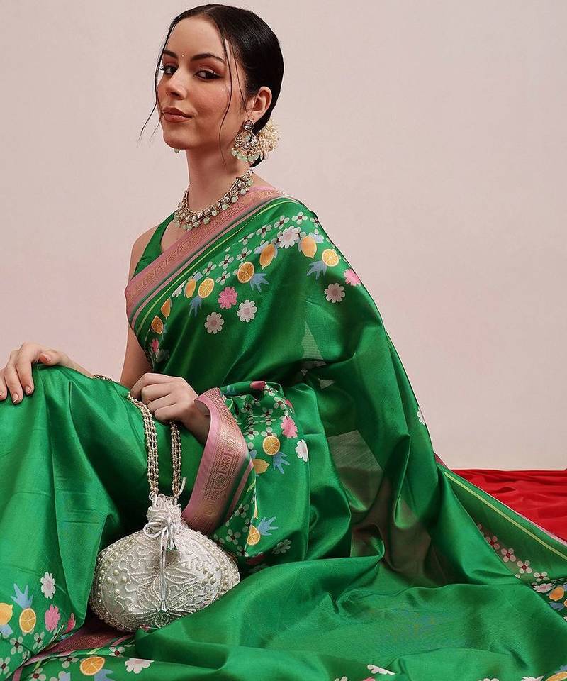 Green printed art silk ethnic saree with blouse piece