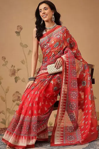 Red printed cotton blend ethnic saree with blouse piece