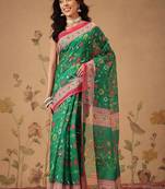 Green printed cotton blend ethnic saree with blouse piece