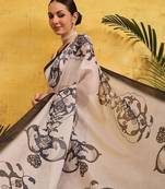 Off white printed silk cotton ethnic saree with blouse piece
