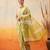 Yellow printed cotton blend ethnic saree with blouse piece