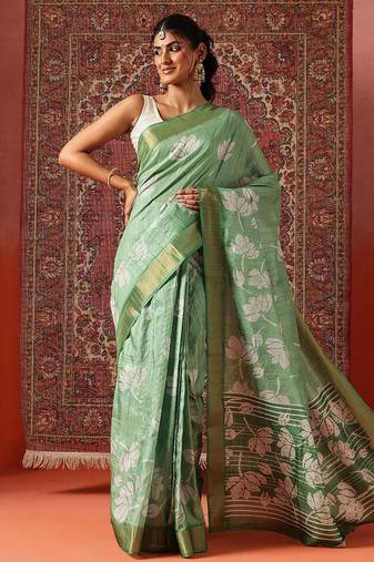 Green printed art silk ethnic saree with blouse piece