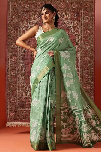 Green printed art silk ethnic saree with blouse piece