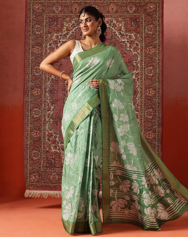 Green printed art silk ethnic saree with blouse piece