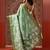 Green printed art silk ethnic saree with blouse piece