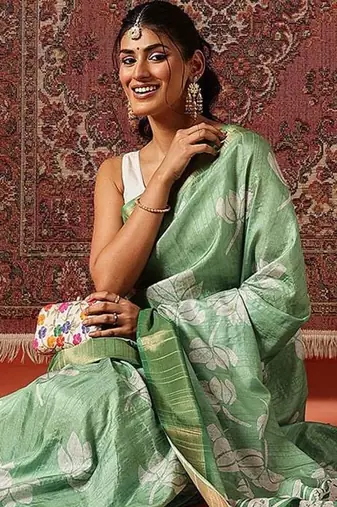 Green printed art silk ethnic saree with blouse piece
