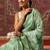 Green printed art silk ethnic saree with blouse piece