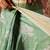 Green printed art silk ethnic saree with blouse piece