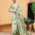 Green printed cotton blend ethnic saree with blouse piece