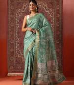 Sea green printed art silk ethnic saree with blouse piece