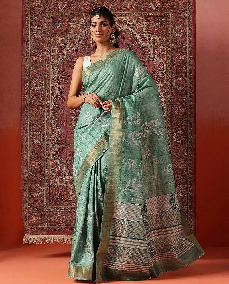 Sea green printed art silk ethnic saree with blouse piece