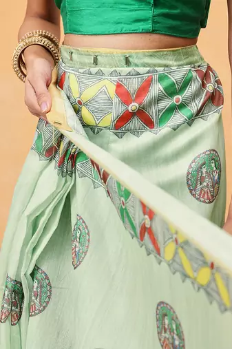 Green printed cotton blend ethnic saree with blouse piece