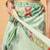 Green printed cotton blend ethnic saree with blouse piece