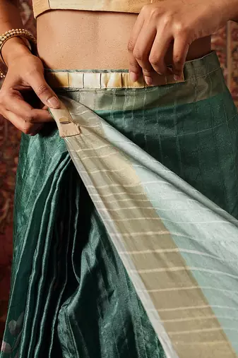 Green printed art silk ethnic saree with blouse piece