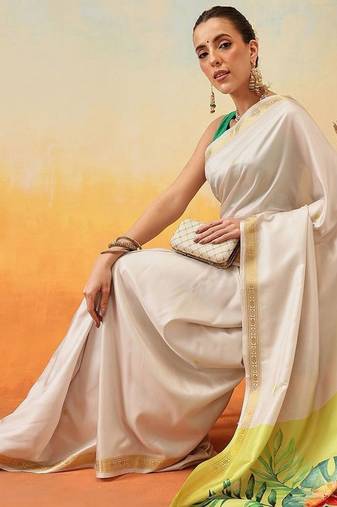 Off white printed art silk ethnic saree with blouse piece