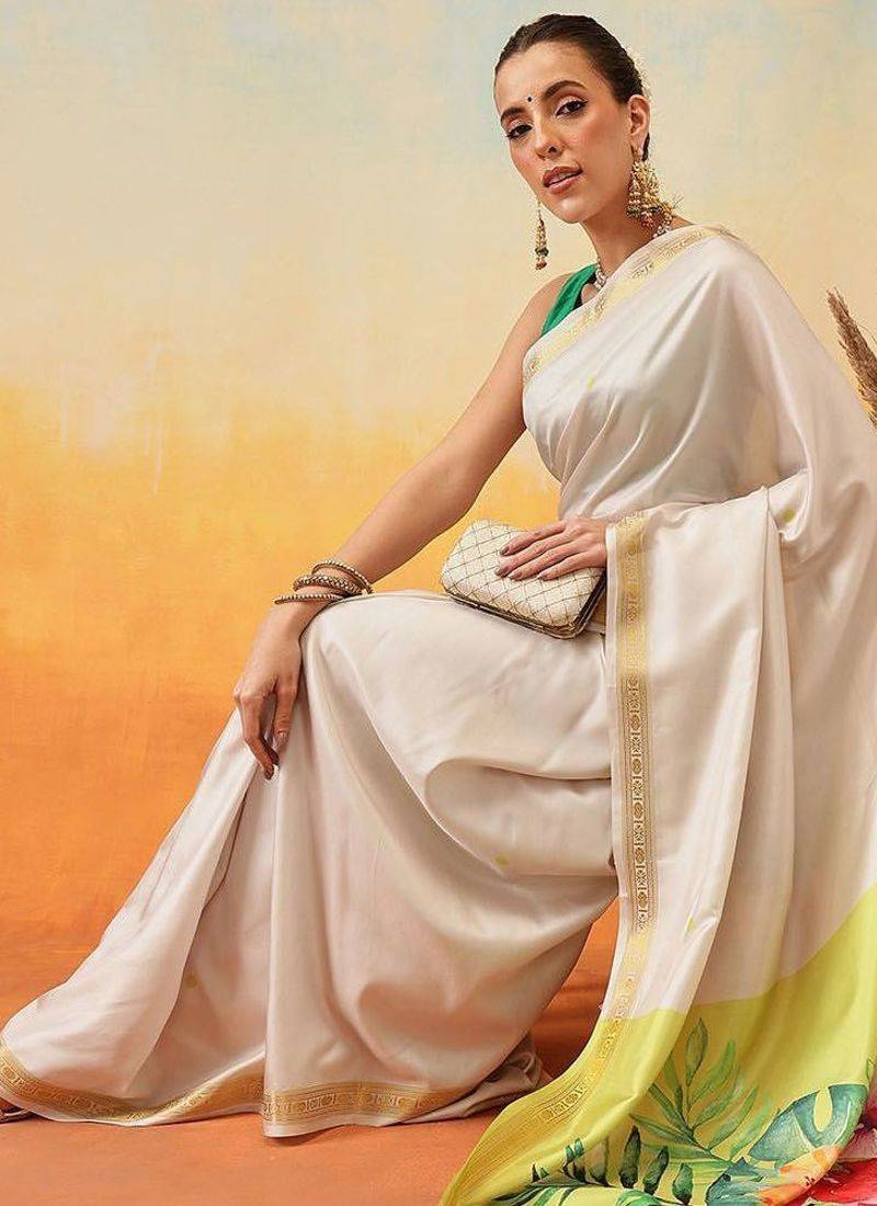 Off white printed art silk ethnic saree with blouse piece