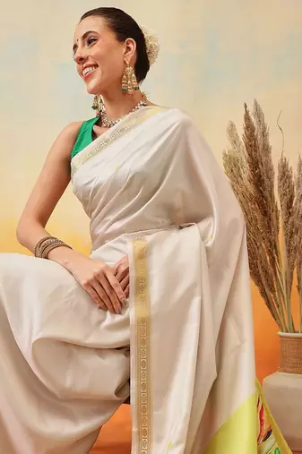 Off white printed art silk ethnic saree with blouse piece