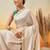 Off white printed art silk ethnic saree with blouse piece