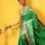 Green printed silk blend ethnic saree with blouse piece