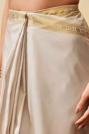 Off white printed art silk ethnic saree with blouse piece