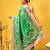 Green printed silk blend ethnic saree with blouse piece