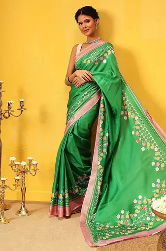 Green printed silk blend ethnic saree with blouse piece